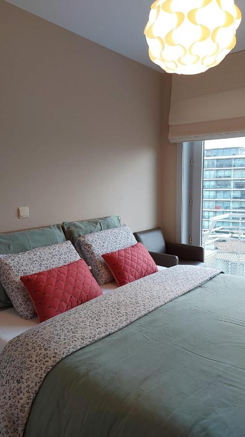 Appartement Met Zeezicht En Verwarmd Zwembad Oostende Bagian luar foto